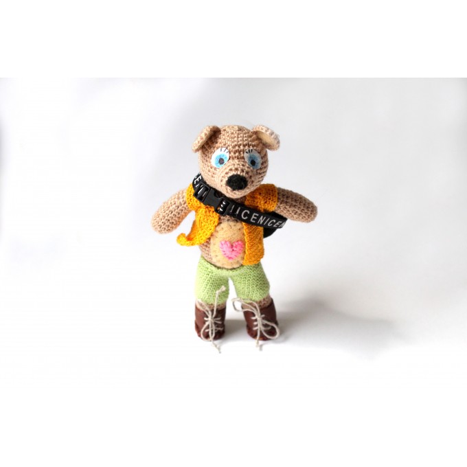 Crochet teddy bear tourist with clothes. Small cute 